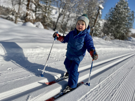 Happy little skier out on the trails! Remember kids ski free every day.